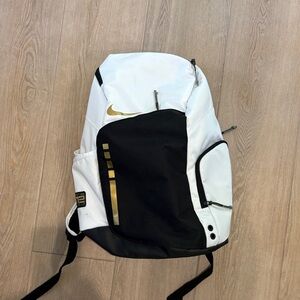 Nike Black and White Backpack with Gold Accents